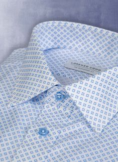 From our Portofino Print collection, our Alexander in Printed Blue "Testazzuro" Shirt is expertly and indelibly printed with a subtle and unique broken-diamond pattern, woven and executed by master craftsmen in Austria. Sporting dreamy, light blue buttons, the result is subtle and highly elegant. Can be worn equally at ease during the day or at night. Can be worn dressed up with a Navy blazer. The Alexander is the trimmest of all our fits, calibrated to accentuate a lean, athletic body type. • T Athletic Body Type, Mens Work Outfits, Navy Blazer, Blue Print, Diamond Pattern, Alexander, Work Outfit, Printed Shirts, Light Blue