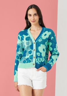 A split color jacquard cardigan designed to have a slightly cropped fit. Added contrast hand-embroidery around the neck and sleeves by artisans in India. Casual Jacquard Knit Outerwear For Spring, Spring Jacquard Knit Long Sleeve Cardigan, Cotton Jacquard Knit V-neck Sweater, Spring Multicolor Jacquard Knit Cardigan, Multicolor Jacquard Knit Cardigan For Spring, Long Sleeve Jacquard Knit Cardigan, Jacquard Knit Long Sleeve Cardigan, Spring Jacquard Knit V-neck Sweater, Green Jacquard Knit Long Sleeve Cardigan