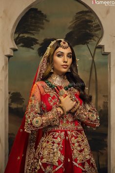 Buy Designer Red Bridal Lehnga Gown for Wedding Wear in Silk and Chiffon fabric Enhanced with Hand-Embellished Golden work. Customizable. Fast Shipping Red Dabka Lehenga For Reception, Red Tilla Saree For Reception, Red Dabka Wedding Gown, Red Gown With Pallu For Traditional Ceremonies, Red Saree With Dabka Embroidery, Red Anarkali Set With Dabka For Reception, Red Anarkali Set With Pallu For Wedding, Traditional Red Saree With Dabka, Red Wedding Salwar Kameez With Traditional Drape