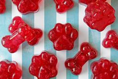 there are many red gummy bears on the table