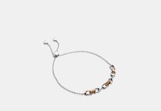 COACH® Outlet | Linked Signature Slider Bracelet Slider Bracelet, Coach Outlet, Birthday Month, Letter B, Letters And Numbers, Hat Sizes, Belt Size, Sliders, Bags Designer