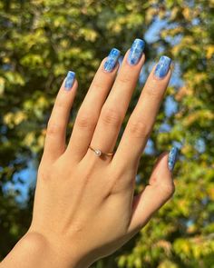 Cirque Colors (@cirquecolors) • Instagram photos and videos Blue Wave Nails Acrylic, Blue Nails Ocean, Holographic Blue Nails, Blue Nails With Glitter Ring Finger, Ocean Blue Sparkle Nails, Blue Sheers