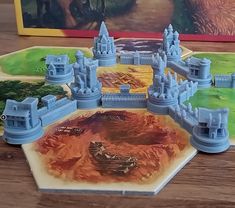 a board game with castles on the table