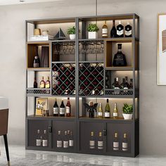 a wine rack with bottles and glasses on it next to a dining room table in front of a painting