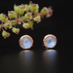 Mesmerizing 5mm round cabochon cut natural rainbow moonstone, like drops of heaven, set in a solid 14k rose gold bezel setting, these studs are you wedding must-have's. They also make for a perfect gifting pair for little girls to women alike. Moonstone Earrings - 5mm Round Cabochon - Rainbow Moonstone - Wedding Stud - June Birthstone - Lobe Screwback - Something Blue * Stone : Natural Rainbow Moonstone * Dimension : 5 mm * Gold - 2 gms 14k, Solid Rose gold * Type : Screwback/Pushback (14K Solid Round Moonstone Cabochon Earrings, Vintage Gold Earrings, Wedding Studs, Vintage Earring, June Birthstone Jewelry, Earring Handmade, Victorian Vintage, Earring Gold, Moonstone Earrings