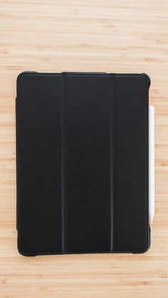 an ipad case sitting on top of a wooden table