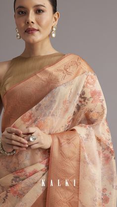 This light yellow tissue silk saree with a delicate floral print exudes elegance and charm.
The intricate zari woven border adds a touch of sophistication, making it perfect for both daytime and evening events.
The soft, shimmering fabric enhances the overall beauty, giving you a graceful and fresh look.
A perfect pick for weddings, festive gatherings, or intimate celebrations.