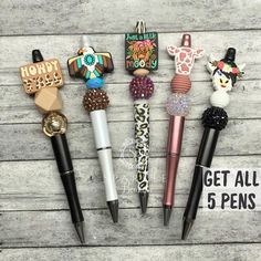 THERE IS ONLY 1 SET LIKE THIS! You get all 5 pens shown in photo! ONCE IT IS GONE IT IS GONE!! Check out our other pens in this store!!  Our Custom Beaded Pens are a fun way to make a statement showing off what you LOVE either at home, school or in the office!  Great for gift giving ~ So Unique and Custom! These pens have beads and most have a silicone focal bead.  We will test to make sure your pen is working before we ship to you FREE SHIPPING when you order $35 or more ;)  🖤  DISCLAIMER  🖤 Novelty Pen, Beadable Pens, Cowgirl Gifts, Beaded Pens, Cedar City, Personalised Pens, Cute Office, Beadable Products, Home School