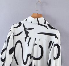 Product Type: Shirts Style: Office,Casual Fit: Loose Fabric: Polyester Pattern: Printed Element: Non Top Length: Long Neckline: Collared Sleeve Type: Regular Sleeve Length: Long Sleeve Main Composition: Polyester Season: Spring/Fall White Long Sleeve Tops With Abstract Print, White Long Sleeve Top With Abstract Print, Spring Office Shirt With Graphic Print, Trendy White Blouse With Abstract Print, Skirt Shorts Outfit, Printing Shirt, Shirts Style, Loose Fabric, Outerwear Vest