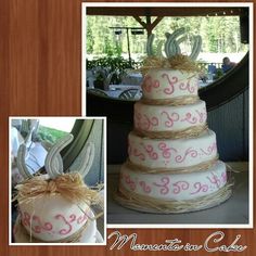 a wedding cake decorated with pink and white icing