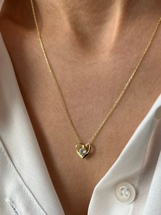 Beautiful minimalist heart beats for you 💛 Get this beautiful minimalist jewelry made with the quality of perfect elements✨ You can choose 925K Sterling Silver with the options of Gold, Rose Gold or White Gold colors. High quality jewelry for everyone 🤍  Details * 925K Sterling Silver Option → 14K Gold, Rose Gold or White Gold plated * Chain length is approximately 18 inches (16+2 in extender) / 45 cm (40+5 cm extender) * Time is everything! You will receive your package as soon as possible 🚚  * We care about the quality of metal to make sure it will last for a long time * We use enamel technique to color the jewelry and high quality zircons only * There can be tiny differences on each item. Length difference of the chain as well as color changes and shade differences of the stones and Minimalist Heart Jewelry For Anniversary, Minimalist Heart-shaped Birthstone Jewelry, Minimalist Heart-shaped Anniversary Jewelry, Minimalist Double Heart Gold Plated Necklace, Minimalist Gold Plated Heart Cut Jewelry, Minimalist Heart Cut Gold Plated Jewelry, Minimalist Tarnish Resistant Heart Necklace, Minimalist Gold Plated Double Heart Necklace, Minimalist Double Heart Gold-plated Necklace