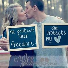 a man and woman kissing while holding signs that say he protects our rights, she protects my freedom