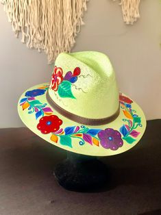 Trendy sun hats, made and handpainted in Mexico with exquisite attention to detail. Size Medium.  Brighten your day and stand out from the crowd! Spring Festival Sun Hat Hand Painted, Spring Festival Hand Painted Sun Hat, Hand Painted Curved Brim Sun Hat For Festivals, Multicolor Wide Brim Hand Painted Sun Hat, Hand Painted Sun Hat With Curved Brim For Spring, Hand Painted Curved Brim Sun Hat For Spring, Artsy Hand Painted Fedora With Curved Brim, Artisan Handmade Sun Hat For Spring, Handmade Artisan Sun Hat For Spring