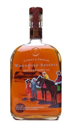 a bottle of woodford reserve kentucky derby whiskey on a white background with an orange label