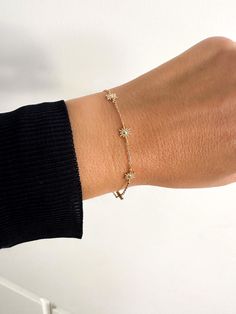 This beautiful silver Stars bracelet has an extender chain as adjusts to fit different wrist sizes. This dainty bracelet looks gorgeous stacked with other bracelets and watch. Simple, delicate and versatile... you'll want in your collection. D E T A I L S *  Available in sterling silver or Crafted in Gold plated 925 sterling silver * Very easy to put on * Adjustable from 16 to19 cm.  * An extender chain means it adjusts to fit different wrist sizes. - we use only the finest quality materials - all components are 100% sterling silver or 18k Gold plated  (Nickel free) - all pieces are designed in our happy studio  All jewelry comes in beautiful packaging, gift ready  Visit our shop www.etsy.com/shop/aranjewels Feel free to contact with us with any questions!  Like us on Facebook! https://www Silver Star Bracelet, Stars Bracelet, Watch Simple, Small Stars, Dainty Bracelet, Star Bracelet, Bracelet Sterling Silver, Dainty Bracelets, Bracelet Silver