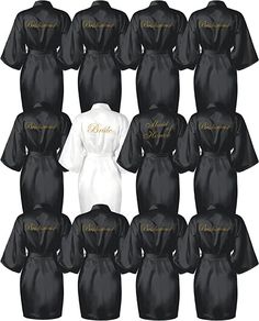 black and white robes with gold lettering on them