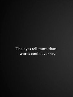 the eyes tell more than words could ever say quote on black background with white lettering