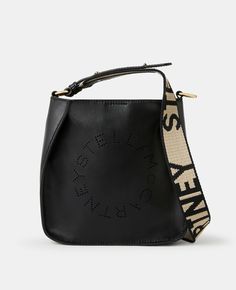 Women's Black Mini Stella Logo Shoulder Bag | Stella McCartney Men Black Shoulder Bag With Logo And Double Handle, Black Double Handle Bag With Logo Hardware, Black Top Handle Shoulder Bag With Logo, Black Leather Shoulder Bag With Logo, Black Top Handle Bag With Logo Hardware, Black Satchel With Logo Hardware And Double Handle, Black Double Handle Satchel With Logo Hardware, Classic Black Shoulder Bag With Logo, Black Tote Bag With Logo Hardware