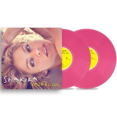 two pink vinyl records with the cover of shakira's free soul on them