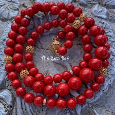 DESCRIPTION: Thank you for coming in! Beautiful rare Mediterranean Sardinia Coral with OX blood red color and sphere shape! The color is directly from the ocean, not dyed! 100% natural beauty! 28 inch necklace with 18k solid gold diamond spacers and clasp! Manufactured in Italy! 327 carats! You'll get the necklace you see! SIZE of the coral : Appr.7.5mm-11.5mm COLOR: OX Blood Red GRADE: AA Red Coral Jewelry With 8mm Beads, Red 8mm Beads Jewelry For Meditation, Luxury Red Beaded Bracelets, Luxury Red Necklace With Polished Beads, Luxury Red Coral Necklaces, Luxury Red Coral Necklace, Red Polished Beads Necklace For Meditation, Red Necklaces With Round Beads For Meditation, Elegant Red Beaded Bracelets For Meditation