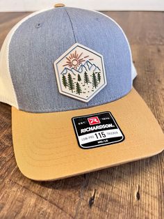 This unique sunrise mountain scene PVC patch hat will be the perfect on trend gift for the outdoorsman in your life! Richardson 112 Snapback Trucker Style Hat.  Trendy hat for men Outdoor gift for men Christmas gift for husband Christmas gift for son Hat for son Hat for men PVC patch hat Outdoor Trucker Hat With Patches And Curved Brim, Outdoor Snapback Hat With Embroidered Patch, Outdoor Six-panel Dad Hat With Logo Patch, Outdoor 5-panel Hat With Logo Patch, Patched 5-panel Trucker Hat, Sunrise Mountain, Pvc Patches, Pregnancy Announcement Gifts, Christmas Gifts For Husband