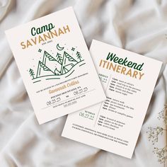 two wedding programs on a bed with flowers and greenery in the background for a camping theme