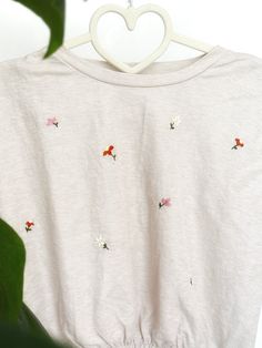 This cute crop top has tiny hand embroidered flowers and it is perfect gift for sister, daughter, girlfriend, your best friend or just your self. It will be the favorite top for women who wants to have something both stylish and cute in their wardrobe for summer.  It has a slight shoulder pad look too! Size: Small  If you have any question, please don't hesitate to reach us. Happy to see you here! NFlow Cute Floral Print Crop Top, Cute Cropped Crop Top With Floral Print, Cute Cropped Floral Print Crop Top, Cute Floral Embroidery Summer Tops, Cute Cotton Crop Top With Floral Print, Cute Cotton Floral Print Crop Top, Trendy Cotton Floral Print Crop Top, Cute Embroidered Summer Tops, Embroidered Summer Crop Top