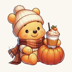 a brown teddy bear sitting next to a pumpkin with a cup of coffee on it