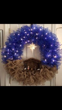 a nativity wreath with lights on it and the words love this nativity wreath what do you think?