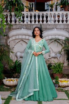 Beautiful ombre angrakha dress with pleated flare at the waist. The yoke is printed and intricately embroidered. It is paired with a net dupatta having buti and border.
– Non padded
– hand embriodered yoke
– Fully lined
– Zipper and hook opening at the back Traditional Pista Green Maxi Length Anarkali Set, Eid Anarkali Set With Sheer Dupatta In Maxi Length, Anarkali Set With Sheer Dupatta Maxi Length, Pista Green Floor-length Anarkali Set With Chikankari Embroidery, Green Maxi-length Anarkali Set With Sheer Dupatta, Pista Green Anarkali Gown With Traditional Drape, Green Anarkali Set With Sheer Dupatta, Green Anarkali Dress With Chikankari Embroidery, Pista Green Maxi Anarkali Set With Dupatta