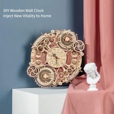 a clock that is on top of a white shelf next to a pink drapes