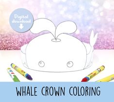 the whale crown coloring is next to some crayons