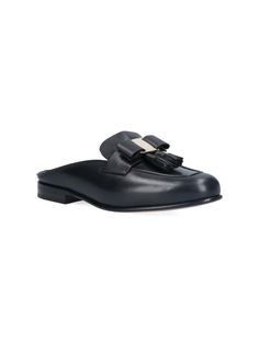 Ferragamo 'Vara' bow mules, black leather, round toe, upper bow detail, upper gold logo plaque, slip-on fit, leather sole. Luxury Calf Leather Slip-ons For Formal Wear, Classic Evening Mules In Calf Leather, Elegant Calf Leather Closed Toe Slip-ons, Elegant Slip-on Mules With Rubber Sole, Luxury Calf Leather Slip-ons With Flat Heel, Formal Flat Heel Mules With Leather Sole, Luxury Slip-ons With Leather Lining For Galas, Luxury Slip-ons For Galas With Leather Lining, Luxury Leather-lined Slip-ons For Galas