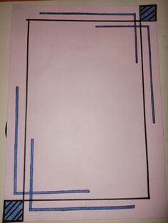 a piece of paper that has been taped together with blue tape and some black lines on it