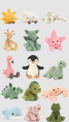 a bunch of stuffed animals sitting on top of each other in different colors and sizes