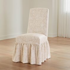 a chair with a ruffled skirt on it