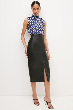 Made From Luxurious - And Responsibly Sourced - Leather, This Versatile Midi Skirt Makes A Directional Alternative To Your Favorite Denim Style. The Demure Pencil Silhouette Is Instantly Modernised By Seamed Detailing And A Central Hem Split - Just Add A Chunky Belt And Strappy Heels To Elevate The Piece For After Dark.This Garment Is Ready For The Future. It Is Made With Responsibly Sourced Leather From Tanneries Working To Reduce Their Environmental Impact. Fitted Leather Pencil Skirt In Modern Style, Fitted Modern Leather Pencil Skirt, Modern Fitted Leather Pencil Skirt, Leather Midi Skirt For Work, Fitted Leather Pencil Skirt For Spring, Spring Leather Midi Skirt, Spring Leather Midi-length Skirt, Chic Leather Pencil Skirt For Work, Leather Midi Pencil Skirt For Spring