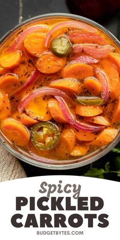 spicy pickled carrots with peppers and jalapenos in a bowl