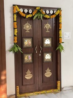 a wooden door decorated with flowers and decorations