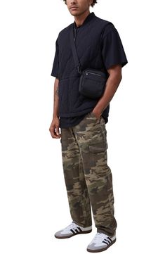 March to a utilitarian beat in these cargo pants cut from soft cotton and plenty of pockets for all your daily essentials. 32" inseam; 10 1/2" front rise Zip fly with button closure Front slant pockets; cargo flap-patch pockets; back flap-patch pockets 100% cotton Machine wash, line dry Imported Mens Camo Pants Outfit Men's Fashion, Urban Camouflage Parachute Pants With Pockets, Utility Parachute Pants With Functional Pockets, Camouflage Utility Cargo Jeans, Utility Camouflage Cargo Jeans With Side Pockets, Tactical Khaki Cargo Pants With Functional Pockets, Camouflage Utility Cargo Pants For Streetwear, Utility Style Camouflage Cargo Pants For Streetwear, Utility Cargo Jeans With Side Pockets In Camouflage