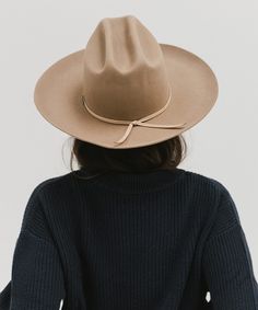 Ezra blends statement fashion with Western. A classic cattleman crown made to be styled for the city as much as the countryside. This hat features an upturned brim + a tall crown, giving Ezra a modern + feminine feel. Ezra comes with a removable tonal grosgrain band featuring a brass Gigi Pip pin. Other bands pictured are sold separately. Wide Brim Hats For Everyday Fall Wear, Everyday Wide Brim Fedora For Fall, Everyday Brimmed Hat For Fall, Fall Everyday Wide Brim Fedora, Fall Fedora With Flat Crown, Everyday Fedora With Flat Crown For Fall, Everyday Fedora Hat For Fall, Everyday Fall Fedora With Flat Crown, Spring Everyday Fedora Felt Hat