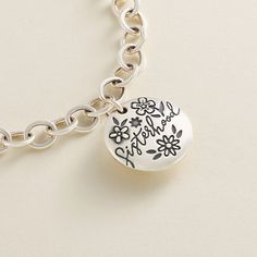 A wonderful gift for the sisters, friends and other women who surround and support you, this sterling silver charm features lots of space on the back to engrave a name, date or initials. Featuring floral accents, it pairs wonderfully with nature- or garden-themed designs. The Sisters, James Avery, A Name, Other Woman, Sterling Silver Charm, Bracelet Sizes, Christmas List, Silver Charms, Initials