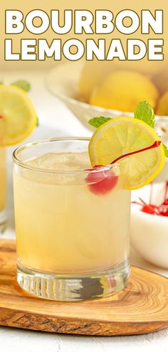 the bourbon lemonade is garnished with mint and served on a cutting board