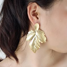 SPECIFICATIONS Material: Metal Item Type: Earrings Gender: Women Leaf-shaped Earrings For Summer, Pierced Leaf-shaped Metal Earrings, Metal Leaf Shaped Earrings, Metal Leaf-shaped Pierced Earrings, Metal Leaf-shaped Jewelry, Leaf-shaped Metal Party Jewelry, Trendy Gold Leaf Jewelry, Luxury Earrings, Statement Drop Earrings