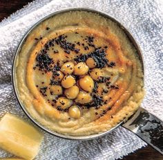 an overhead view of a baked dish with olives