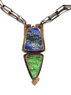 Gold, Silver & Stone Necklace - This one-of-a-kind necklace dazzles with a natural surfaced lapis lazuli with hints of pyrite speckles as well as a lovely uvarovite drusy, set in sterling silver with 18k gold bimetal and fine silver bezels. Please note, the fine silver bezels can take on a golden hue due to the oxidation process. Lobster clasp closure. Magic Necklace, Mixed Media Necklace, Raw Stone Jewelry, Artful Home, Raw Stone, Stone Settings, Fine Silver, Stone Necklace, Stone Jewelry