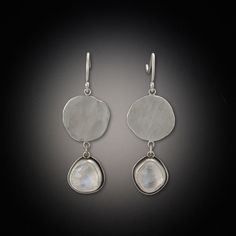 The magic of rose cut moonstones glow within matte silver bezels, below organic disks of hammered sterling. Earrings hang approximately 1.25 inches. Sterling silver. Matte finish. Disk Earrings, Gem Earrings, Earrings Inspiration, Moonstone Earrings, Gold Dots, Moonstone Necklace, Large Earrings, Moon Stone, Stone Earrings