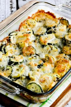 a casserole dish with zucchini and cheese