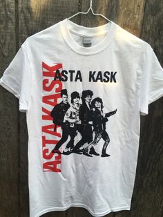 I printed these with black and red plastisol ink on a white t-shirt. This is of the Swedish punk band Asta Kask. This is a normal shirt not an extra soft kind. White Grunge Fan Merchandise Top, White Grunge Fan Merchandise Tops, Band Logo T-shirt For Alternative Fashion, Alternative Style Pre-shrunk T-shirt For Music Festivals, White Grunge Tops For Music Festivals, Alternative Style T-shirt For Music Festivals With Screen Print, Alternative Style Concert T-shirt With Screen Print, White Band Merch Tops For Music Festivals, White Tops With Band Logo For Music Festivals