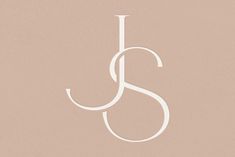 the letter j is shown in white on a light pink background with an elegant design